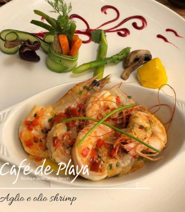 Café de Playa beach front suites Coco Exterior foto